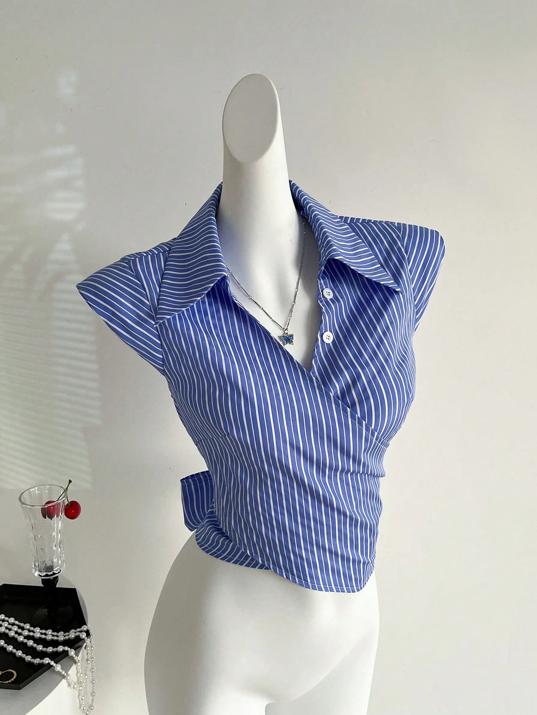 HW7609	Women's New Fashionable Commute Workwear Casual Criss-Cross Strap Bowtie Sleeveless V-Neck Blouse